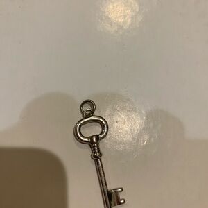 Elegant Silver Key Pendant